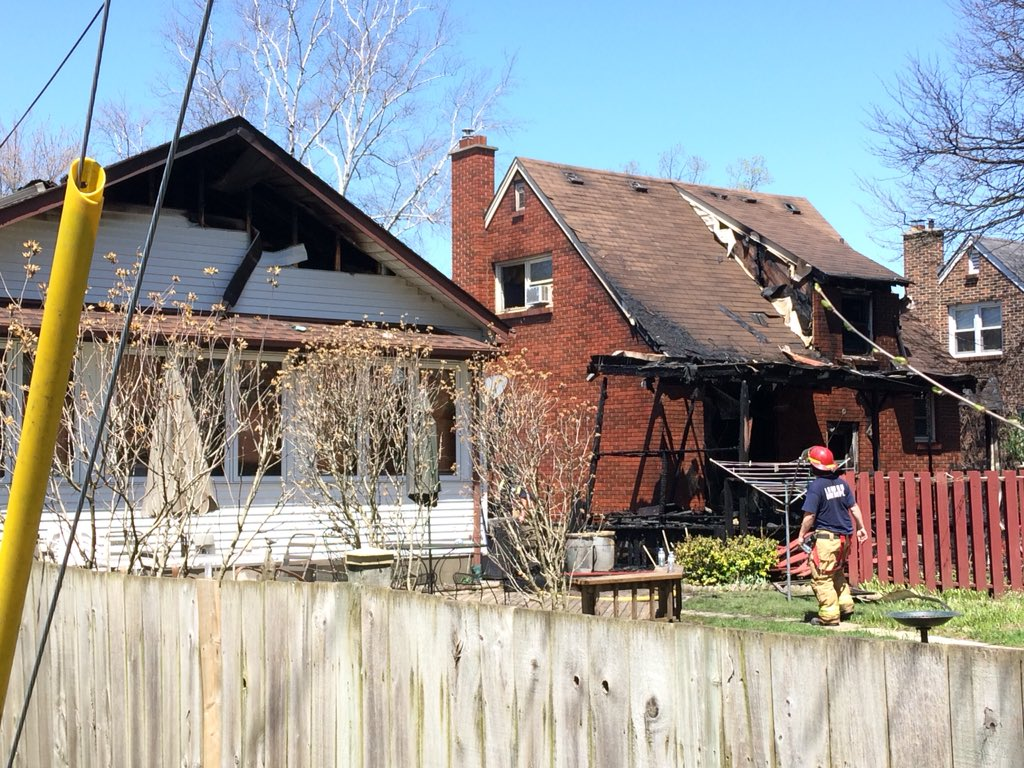 Damage to the back sides of 25 and 27 Glass Avenue.