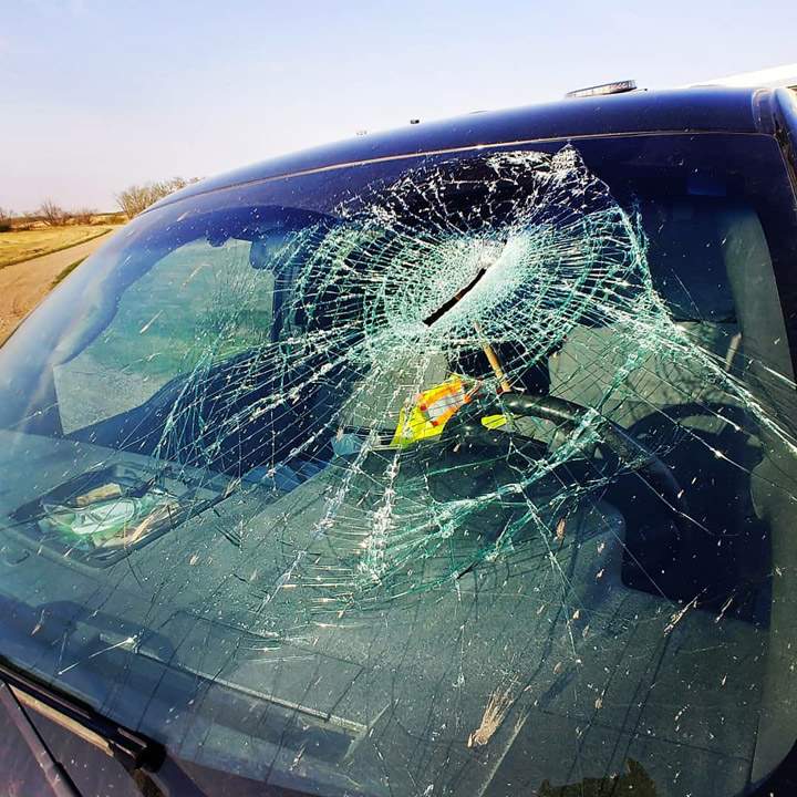 The exterior of Mackenzie Peddle\’s truck after it was hit by an axe on May 16, 2018.