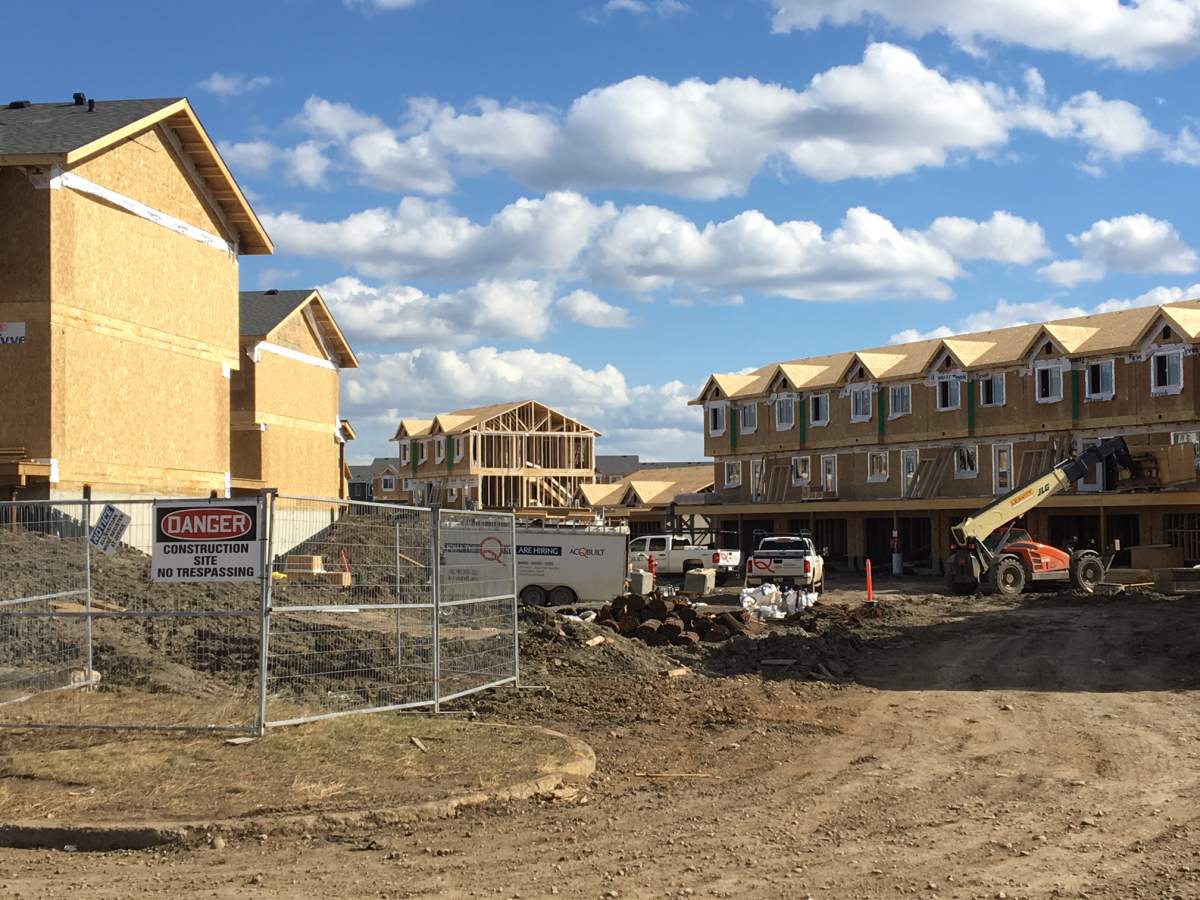 Construction crews work to rebuild homes in the Abasand area of Fort McMurray. May 2018.