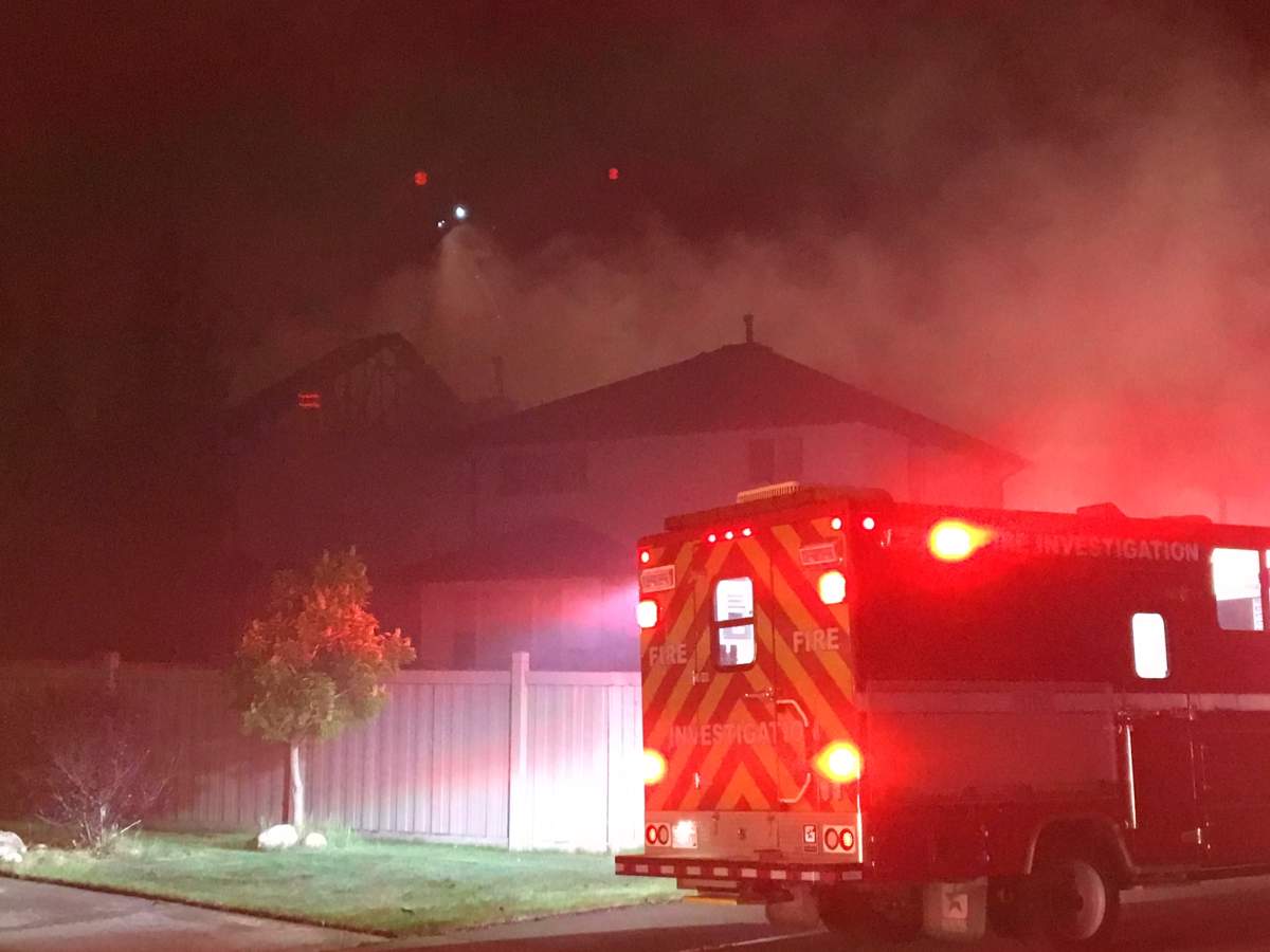 Two homes on Melrose Crescent in the southwest Edmonton neighbourhood of MacEwan were heavily damaged by fire early Wednesday morning. May 30, 2018.