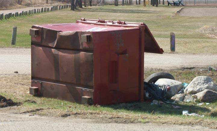 A photo of a damaged garbage bin in Diefenbaker Park on May 5, 2018.