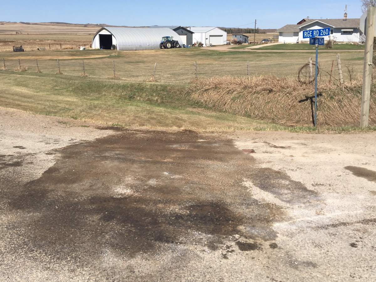 Two people are dead following a collision between and motorcycle and a truck east of Innisfail.