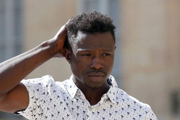 Mamoudou Gassama, 22, from Mali, leaves the Elysee Palace after his meeting with French President Emmanuel Macron, in Paris, May 28, 2018.