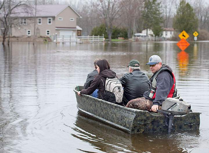 Residents are ferried home at Darlings Island, N.B. on Thursday, May 3, 2018 as the Kennebecasis River flooded the only road into the community.