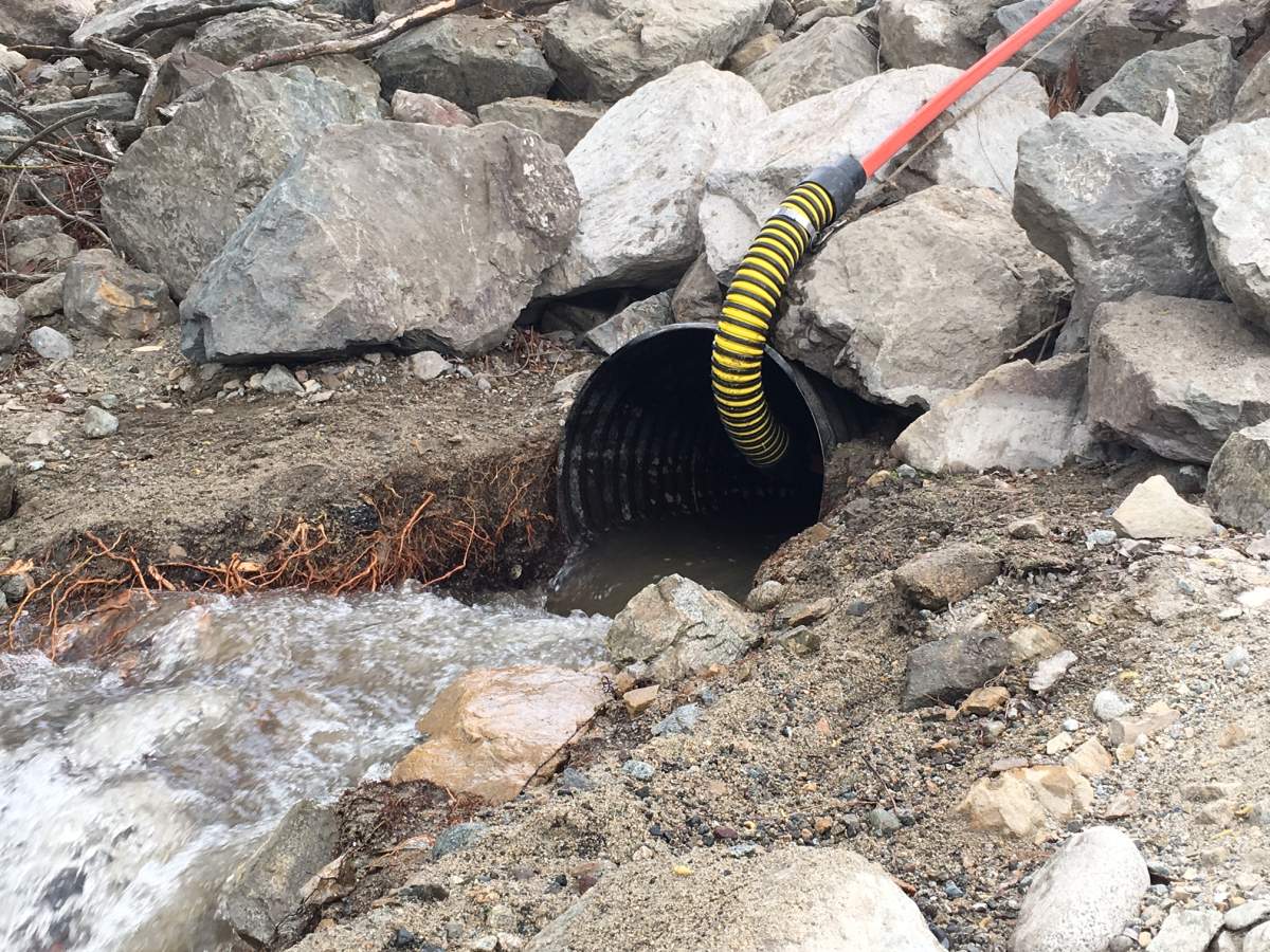 That forced the water out of a crack in the pavement at the foot of Princeton avenue with about 1500 litres a minute washing across Highway 97 into Okanagan Lake.