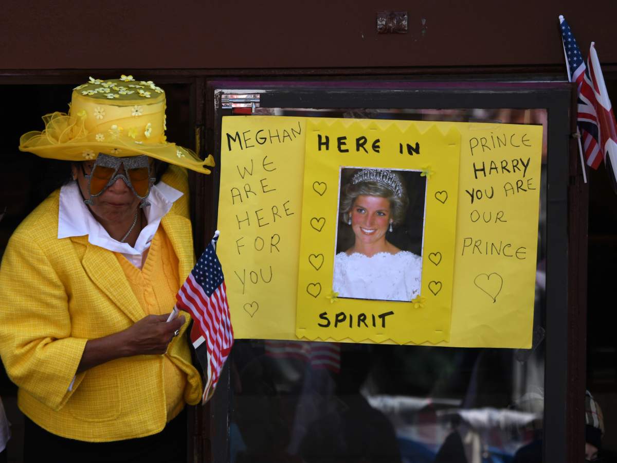 Royal wedding watchers: The crowds come out in full regalia for Prince Harry and Meghan Markle - image
