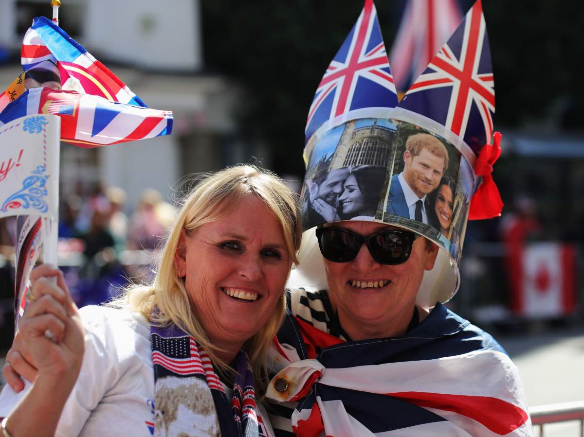 Royal wedding watchers: The crowds come out in full regalia for Prince Harry and Meghan Markle - image