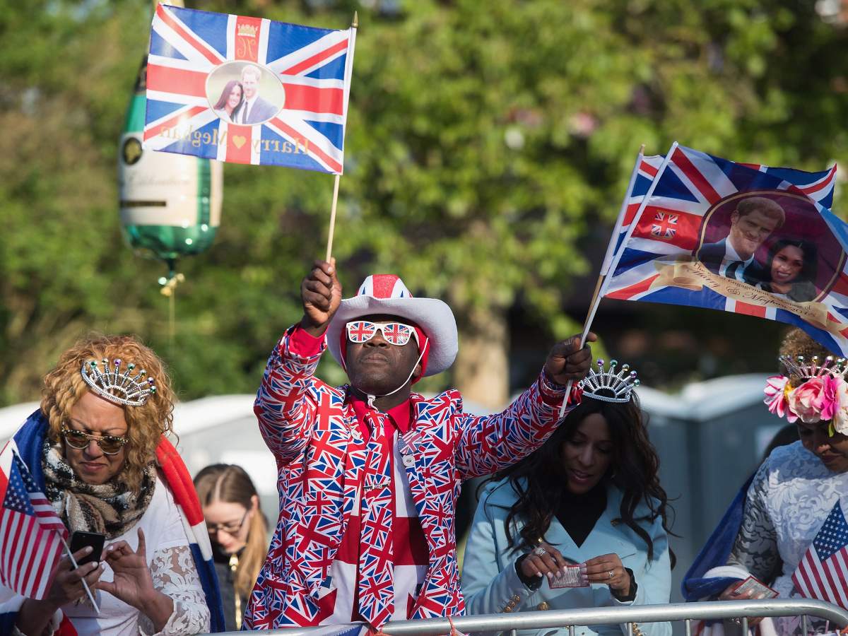 Royal wedding watchers: The crowds come out in full regalia for Prince Harry and Meghan Markle - image