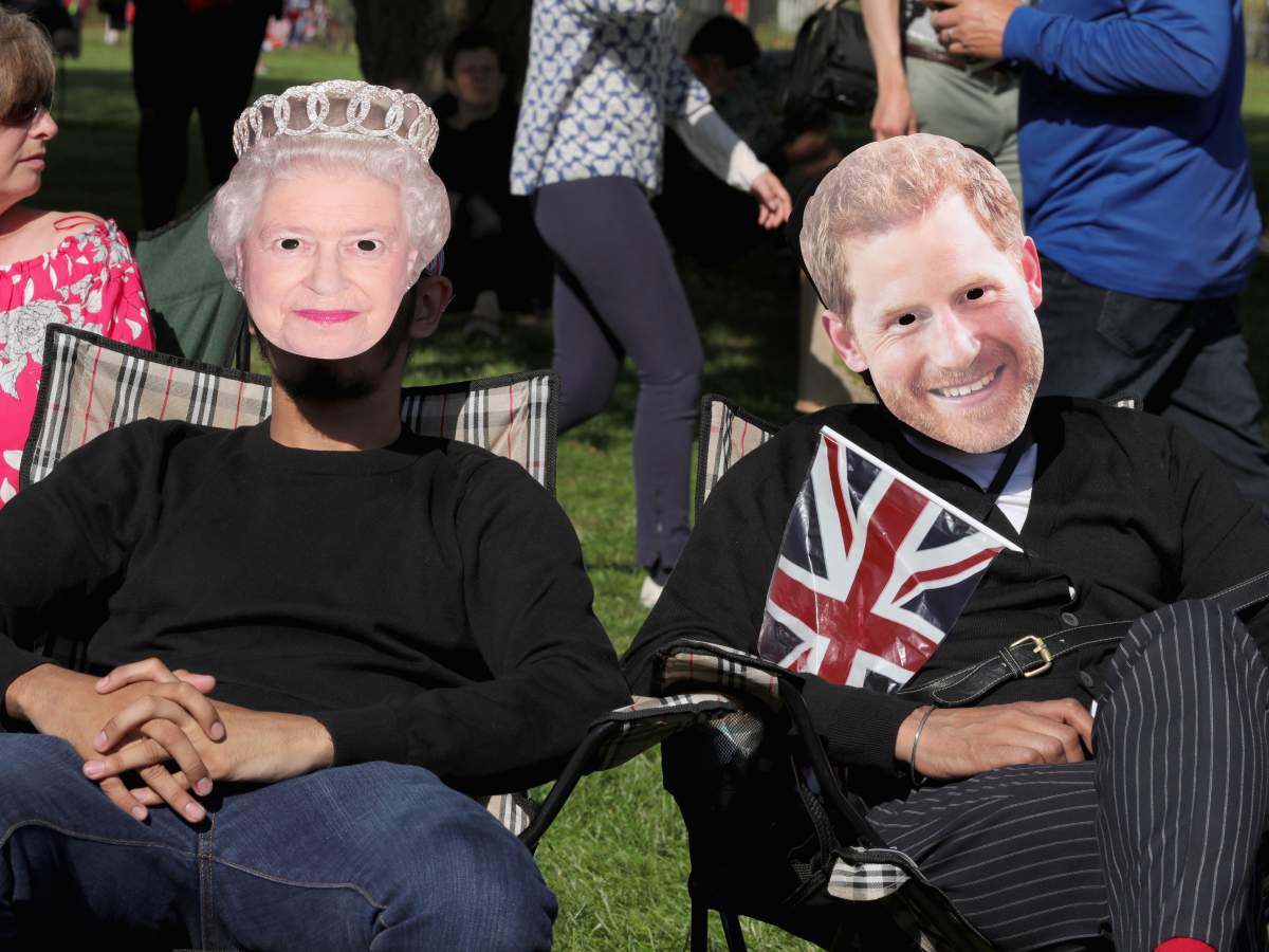 Royal wedding watchers: The crowds come out in full regalia for Prince Harry and Meghan Markle - image