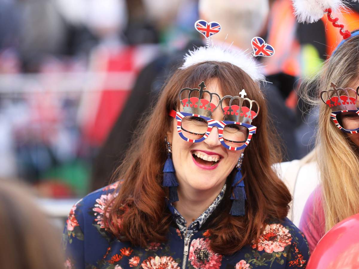Royal wedding watchers: The crowds come out in full regalia for Prince Harry and Meghan Markle - image