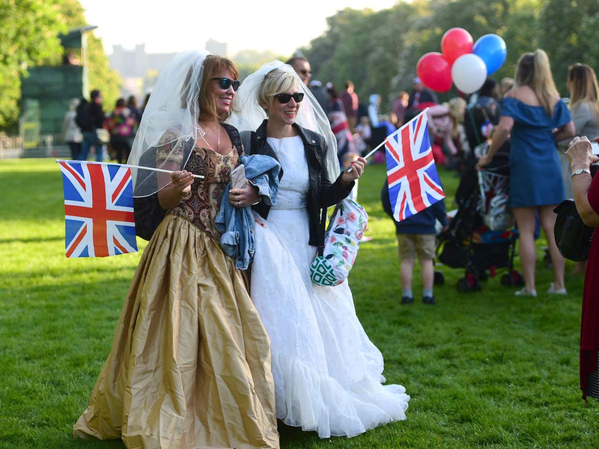 Royal wedding watchers: The crowds come out in full regalia for Prince Harry and Meghan Markle - image
