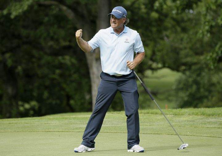 Scott McCarron reacts after making a birdie putt on the 18th green during the final round of the PGA Tour Champions Principal Charity Classic golf tournament, Sunday, June 5, 2016, in Des Moines, Iowa. McCarron won the tournament.