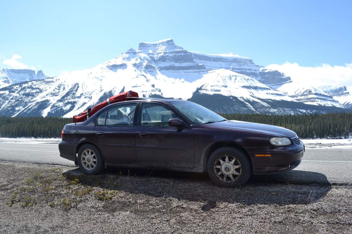 Tame and Hawkins’ stolen Malibu in the Rocky Mountains.