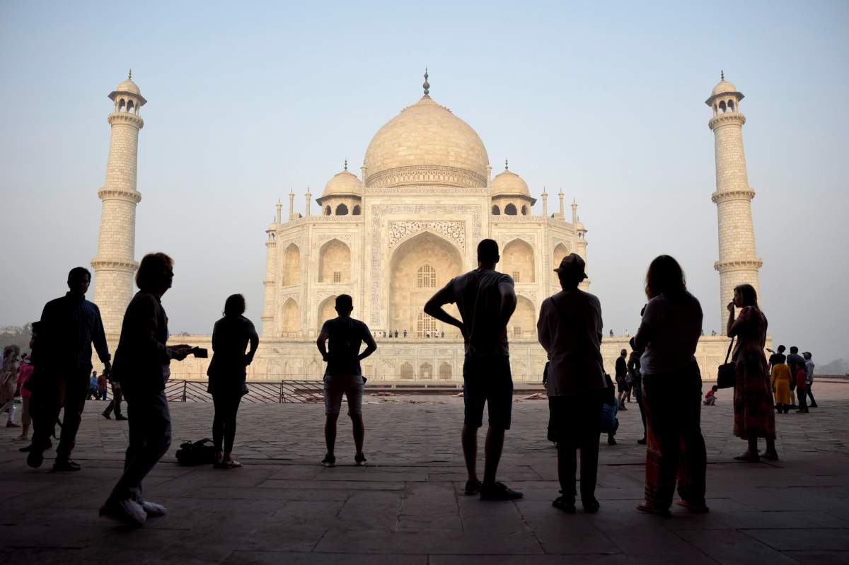 FILE – In this March 22, 2018 file photo, tourists visit India’s famed monument of love, the Taj Mahal, in Agra, India.