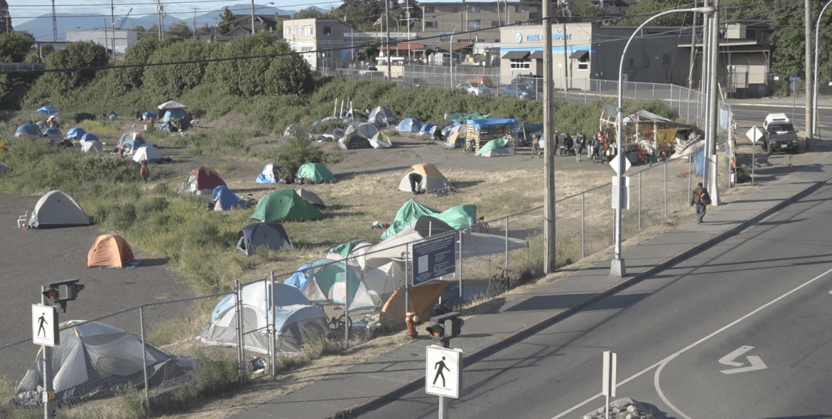 Campers who set up tents on
city-owned land across from a shopping mall in downtown Nanaimo were
served with eviction notices Friday.
