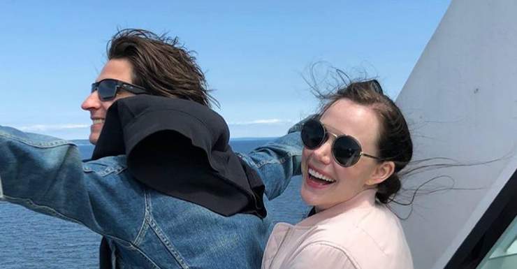 Scott Moir, right, and Tessa Virtue act out a famous scene from "Titanic.".