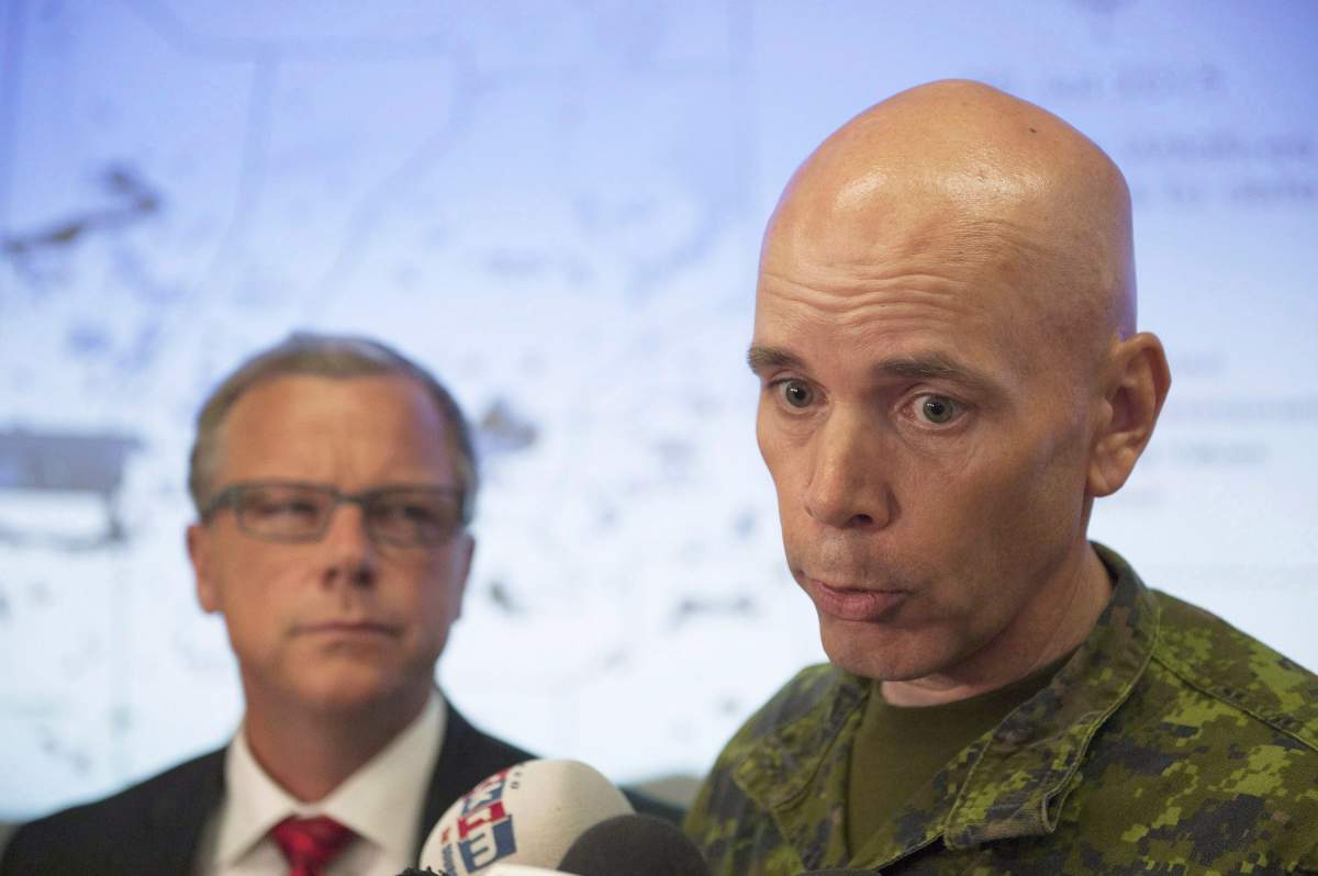 Lt.-Gen. Wayne Eyre, shown above in a 2015 file photo with former Saskatchewan premier Brad Wall (right), has been named to a key role with the UN in Korea.