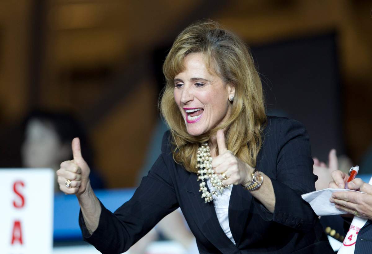 Sandra Pupatello reacts while listening to the results from the second ballot at the Ontario Liberal Party convention at Maple Leaf Gardens in Toronto on Jan. 26, 2013.