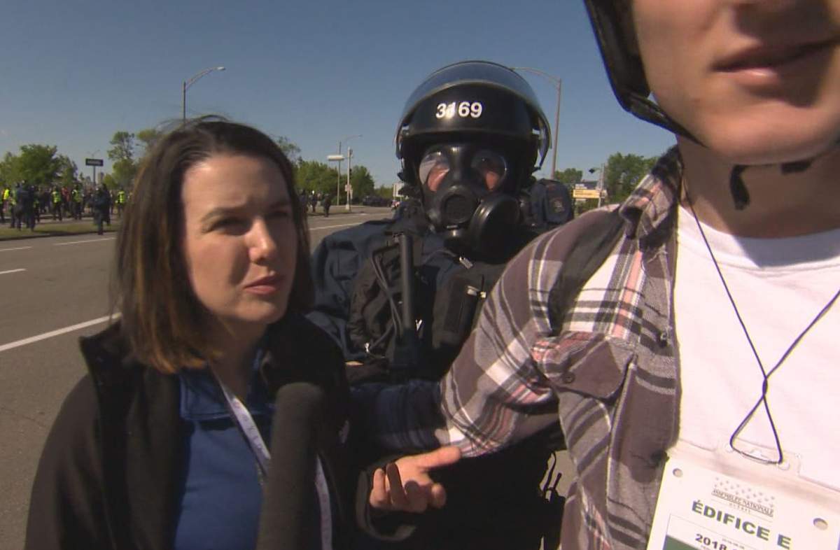 Global reporter Raquel Fletcher is asked to move by a police officer because she was “intimidating him,” Fri. June 8, 2018.