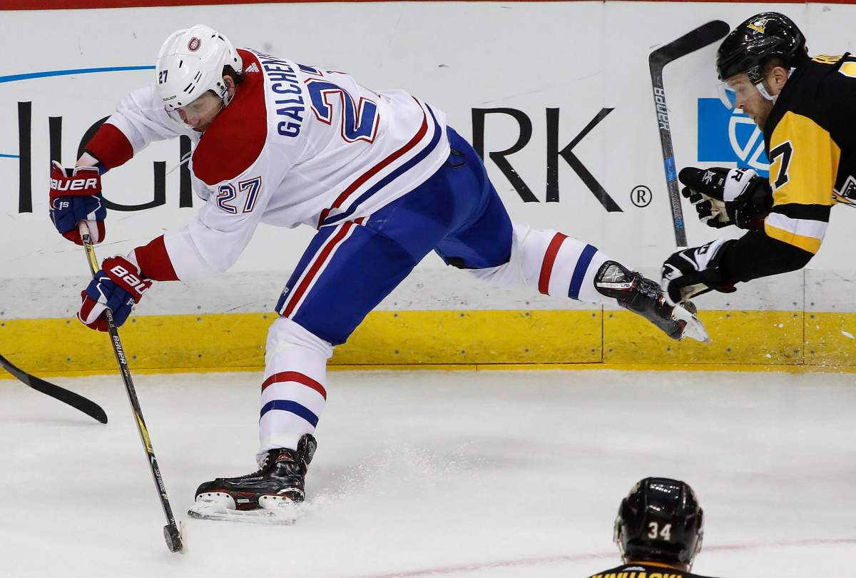 Montreal Canadiens' Alex Galchenyuk (27) gets off a pass in front of Pittsburgh Penguins' Bryan Rust (17) during the third period of an NHL hockey game in Pittsburgh, Wednesday, March 21, 2018. The Penguins won 5-3. (AP Photo/Gene J. Puskar).