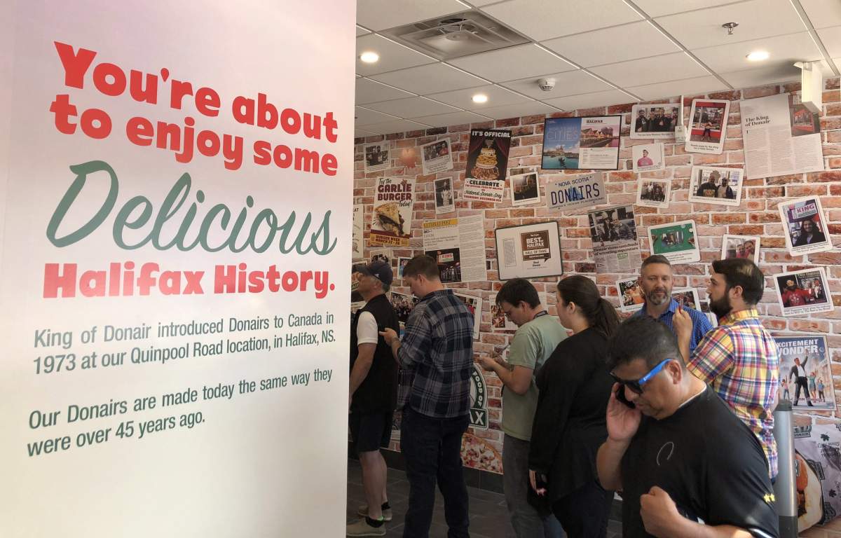 Customers line up at a King of Donair location in Edmonton in a handout photo.