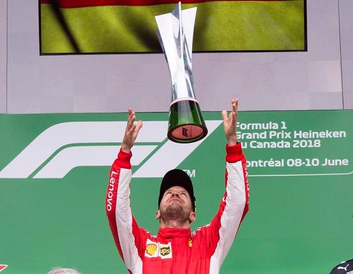 Ferrari driver Sebastian Vettel of Germany celebrates after winning the Canadian Grand Prix Sunday, June 10, 2018 in Montreal.
