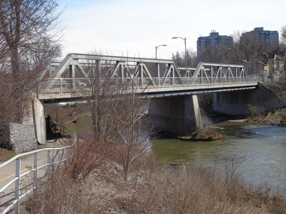 Victoria Bridge runs along Ridout Street, just south of Horton Street, over the Thames River.