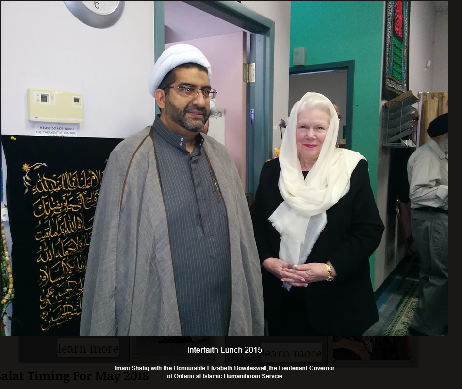 Ontario Lieutenant-Governor Elizabeth Dowdeswell stands beside Sheikh Shafiq Hudda at an interfaith lunch event hosted by his organization in 2015.