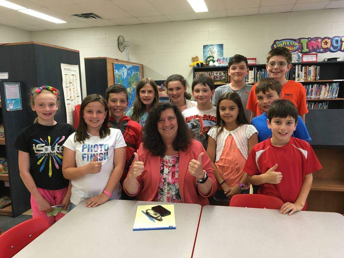 Margaret Manson Elementary's traffic committee meets with principal Stephanie Hérault to present their findings.
