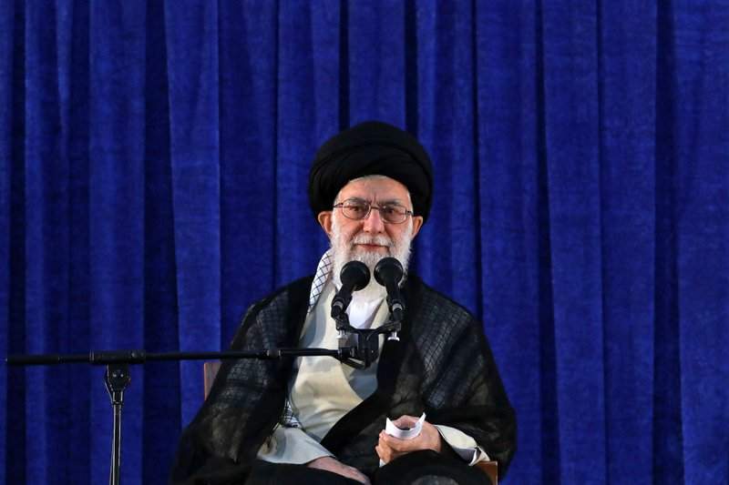 In this picture released by an official website of the office of the Iranian supreme leader, Supreme Leader Ayatollah Ali Khamenei attends a ceremony marking the 29th anniversary of the death of the late revolutionary founder Ayatollah Khomeini, at his mausoleum, just outside Tehran, Iran, Monday, June 4, 2018. 