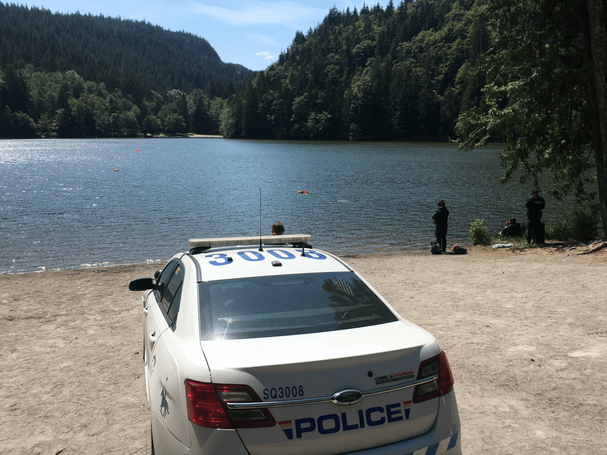 Image of an RCMP cruiser on the scene at Alice Lake, where a man's body was found on June 21, 2018.