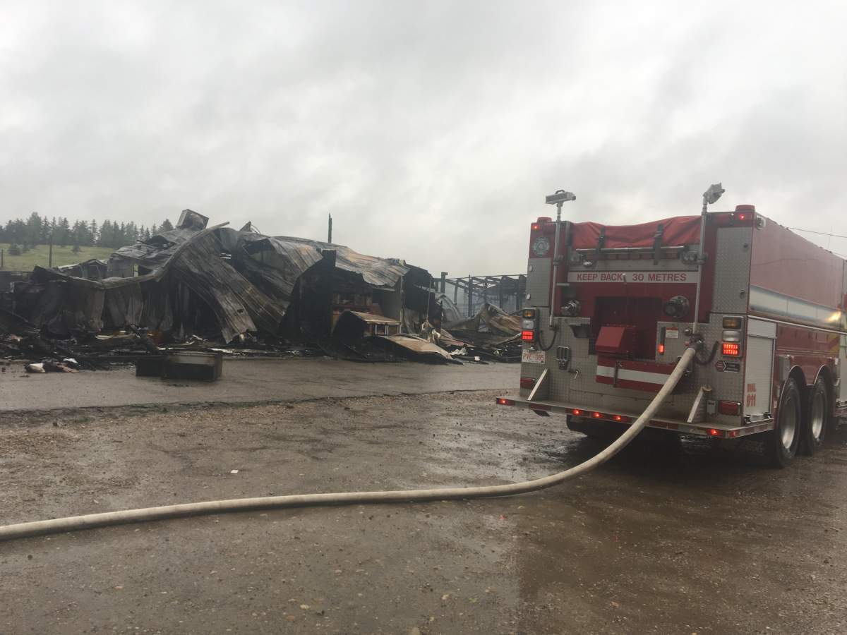 Fire crews remained on scene Saturday morning after an overnight fire at Balzac Meats.