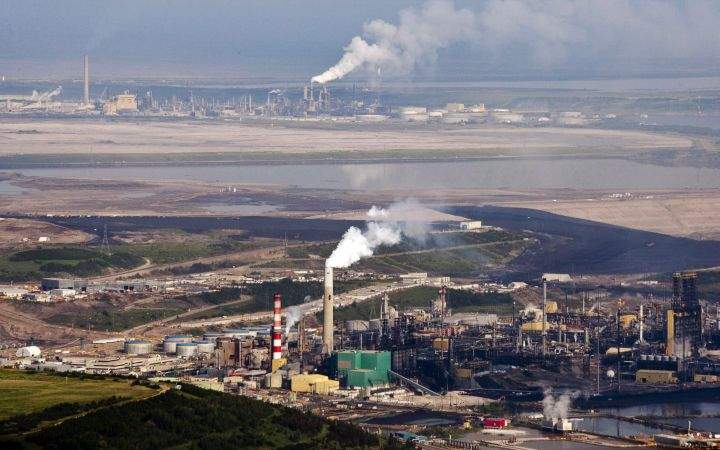 The Suncor oil sands facility seen from a helicopter near Fort McMurray, Alta., Tuesday, July 10, 2012. 