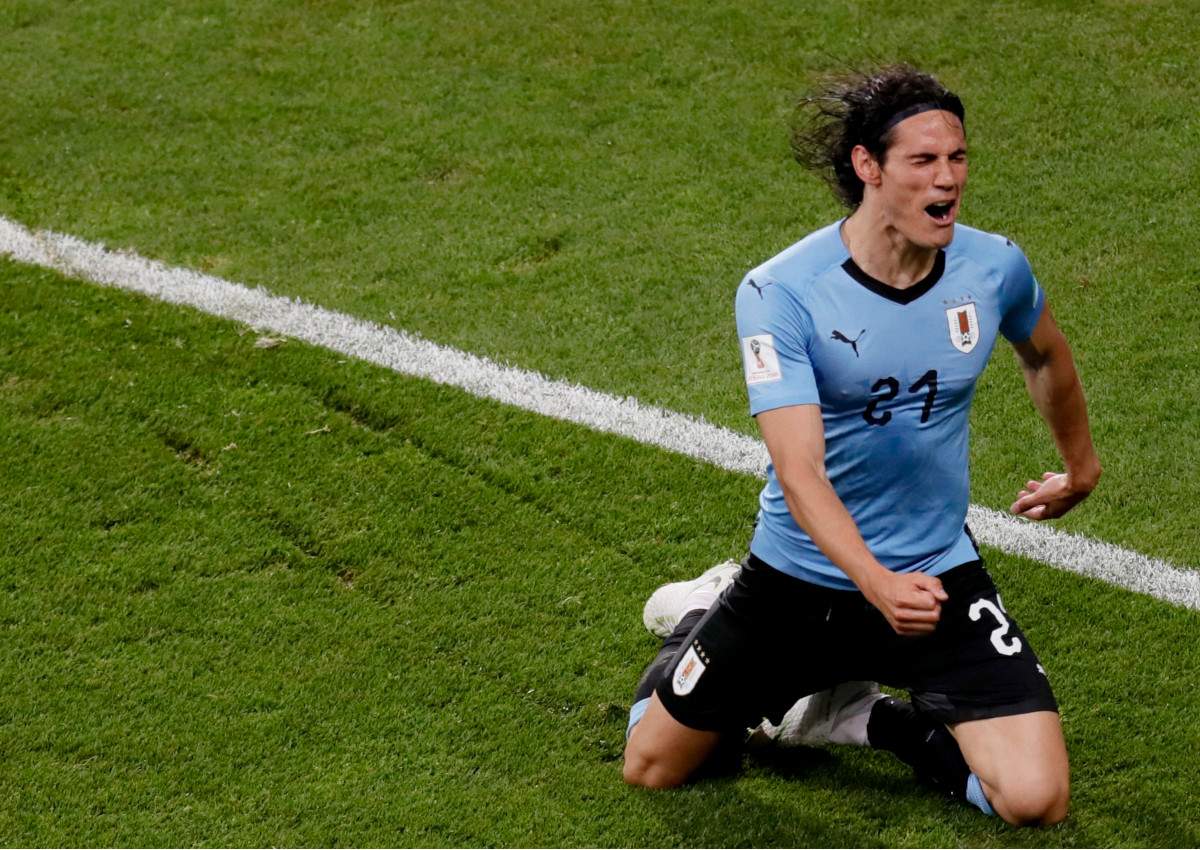 Edinson Cavani of Uruguay celebrates scoring the opening goal during the FIFA World Cup 2018 round of 16 soccer match between Uruguay and Portugal in Sochi, Russia, 30 June 2018.