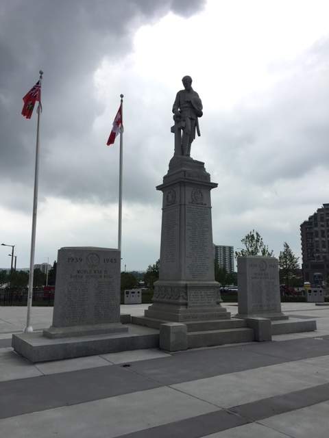 The existing cenotaph was relocated to the center of Memorial Square to be featured more prominently.