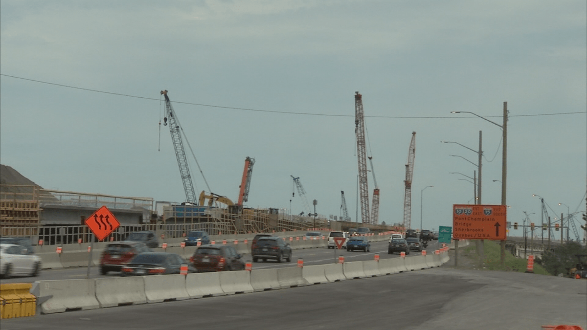 Cranes sit idle at the Champlain Bridge work site as operators walk off the job to protest new training requirements. Monday, June 18, 2018.
