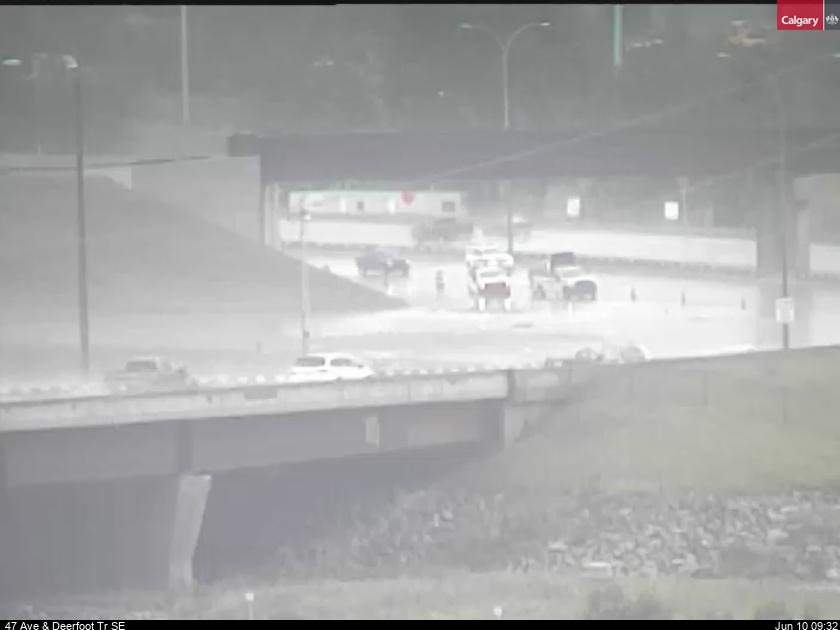 Deerfoot Trail reopens approaching Calfrobe Bridge SE after the road flooded Sunday morning.