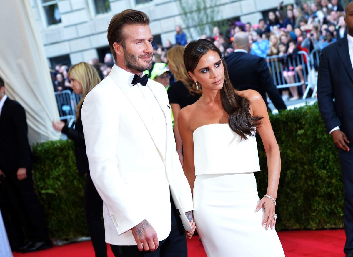 David Beckham (L) and Victoria Beckham attend the "Charles James: Beyond Fashion" Costume Institute Gala at the Metropolitan Museum of Art on May 5, 2014 in New York City. 