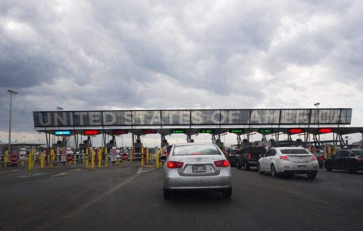 Cars line up to cross into the U.S. at the border on Feb. 25, 2017, in Saint-Bernard-de-Lacolle, Quebec.