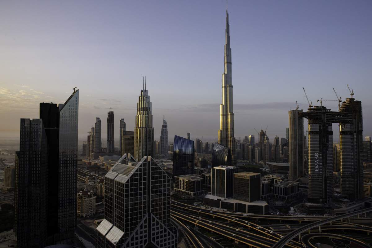 The Burj Khalifa tower, center, stands among city skyscrapers and the Address Sky View, center right, under construction by developers Emaar Properties PJSC, in Dubai, United Arab Emirates, on Wednesday, April 11, 2018.