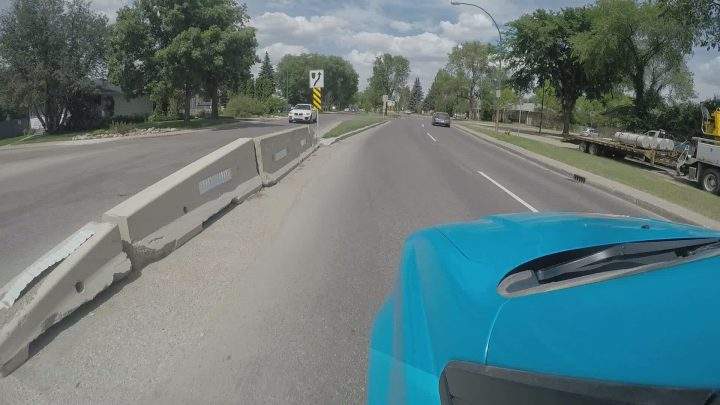 Avalon residents petition for removal of concrete barrier due to traffic concerns - image