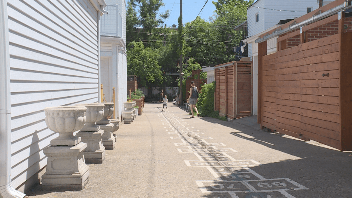 Natalia Hucul and her daughter Olena enjoy Rosemont’s hopscotch alley. June 8, 2018.