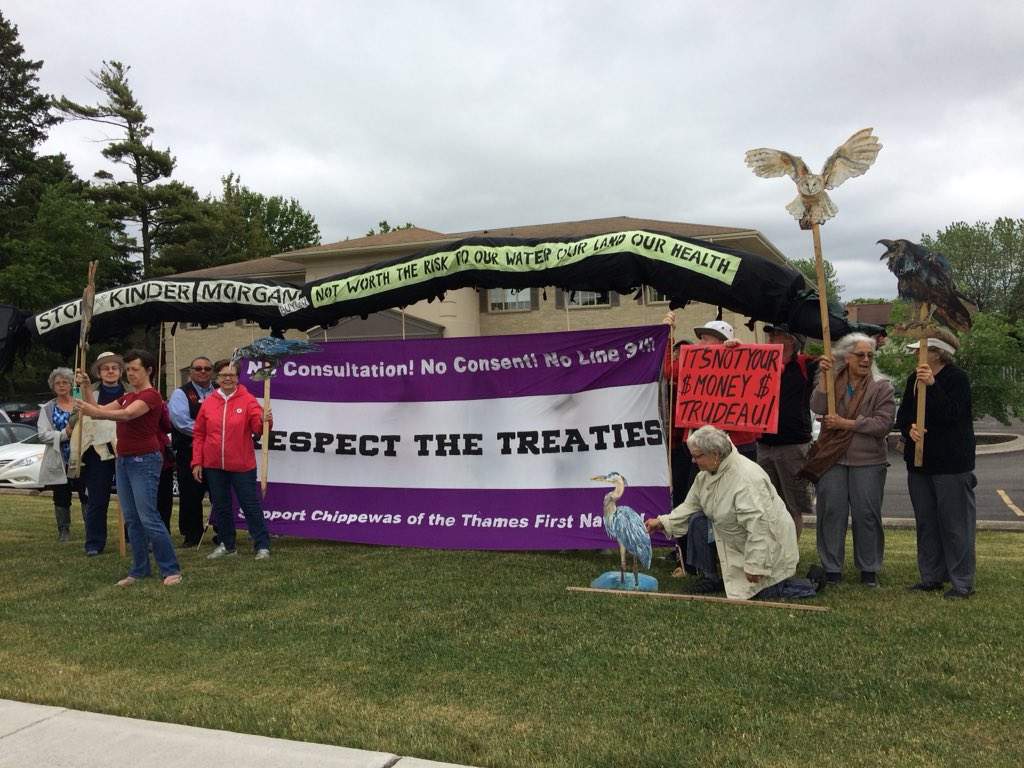 About 24 Londoners protest outside London-West MP Kate Young's office Monday, June 4, 2018, rallying against the Kinder Morgan pipeline.