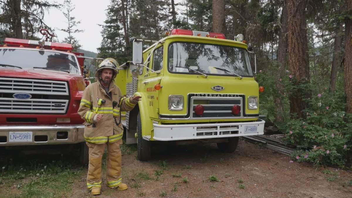 A yellow fire truck belonging to the McLeese Lake Fire Department.