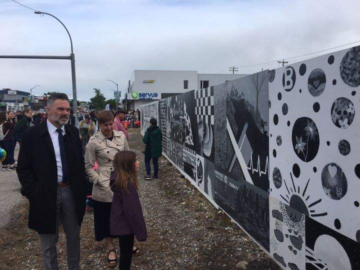 The community mural designed by Bowness High School students was unveiled  on June 11, 2018.