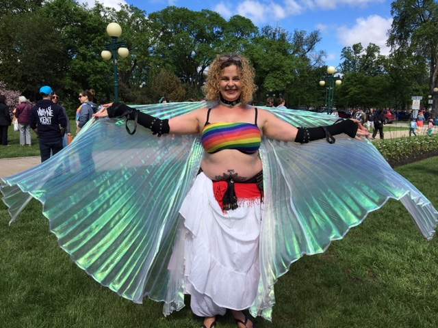 Holly Peterson shows off her costume prior to the parade beginning on Sunday.