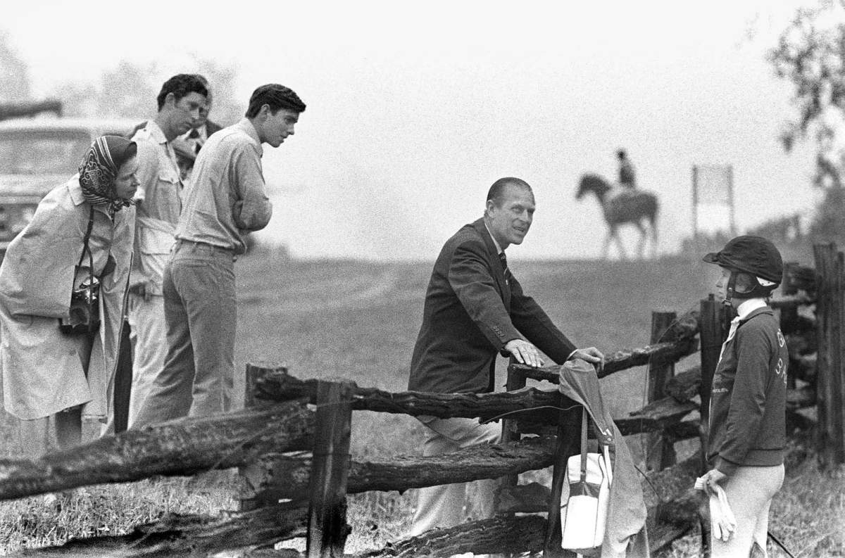 Prince Philip gives Princess Anne a few words of Advice while Queen Elizabeth, Prince Charles and Prince Andrew listen in prior to her starting in the cross-country three day equestrian event at Bromont, Quebec July 24, 1976. The Olympic Games were officially opened in Montreal by Queen Elizabeth July 17.