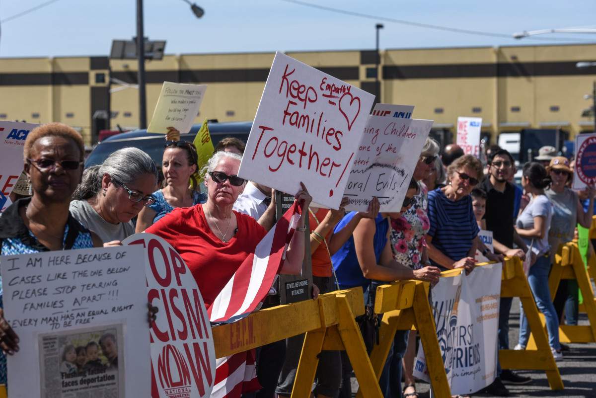People participate in a protest against recent U.S. immigration policy of separating children from their families when they enter the United States as undocumented immigrants, in front of a Homeland Security facility in Elizabeth, NJ, U.S., June 17, 2018. 