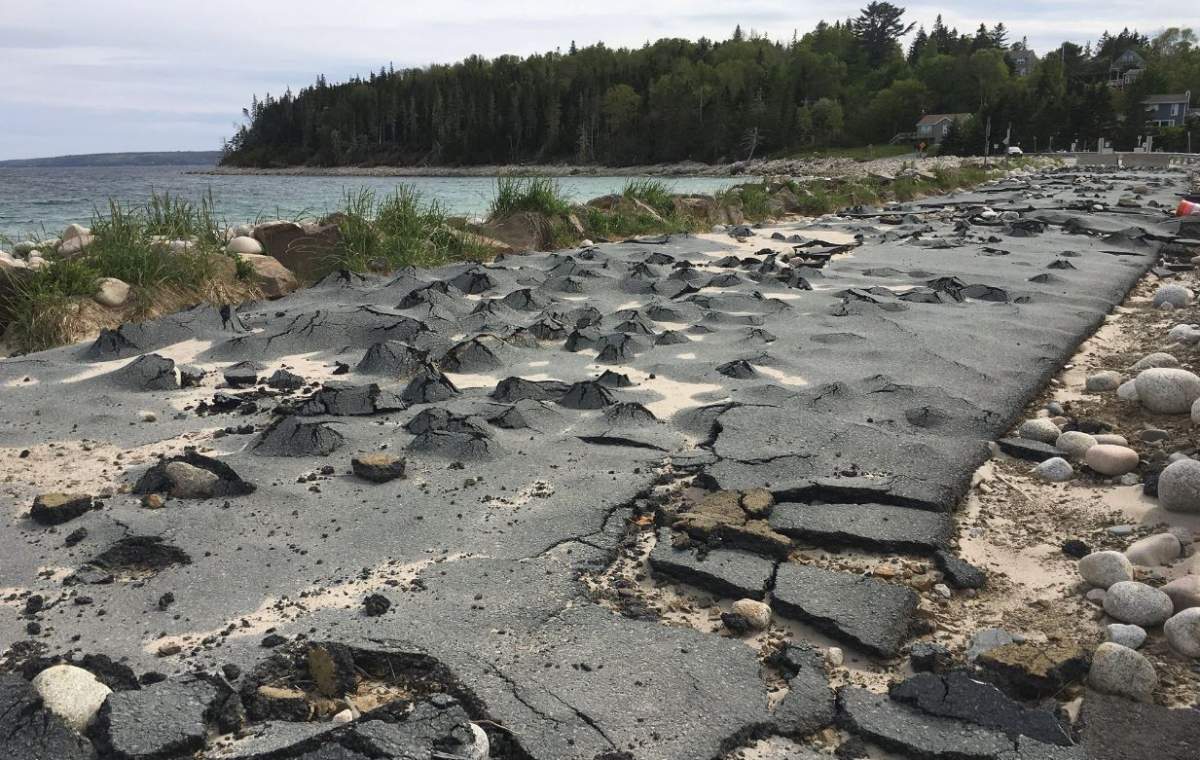The road that runs through Queensland Beach Provincial Park remains damaged months after a severe winter storm hit. 