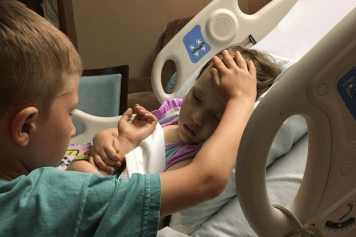 A photo of six-year-old Jackson comforting his sister went viral.